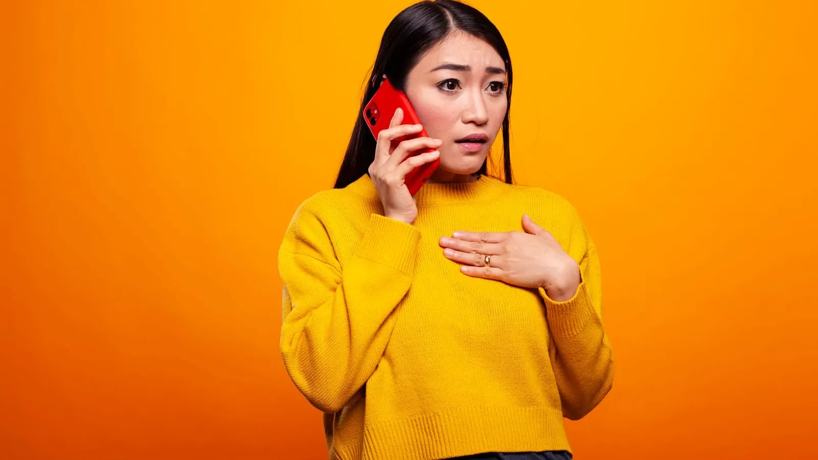 Woman on a call receiving shocking news