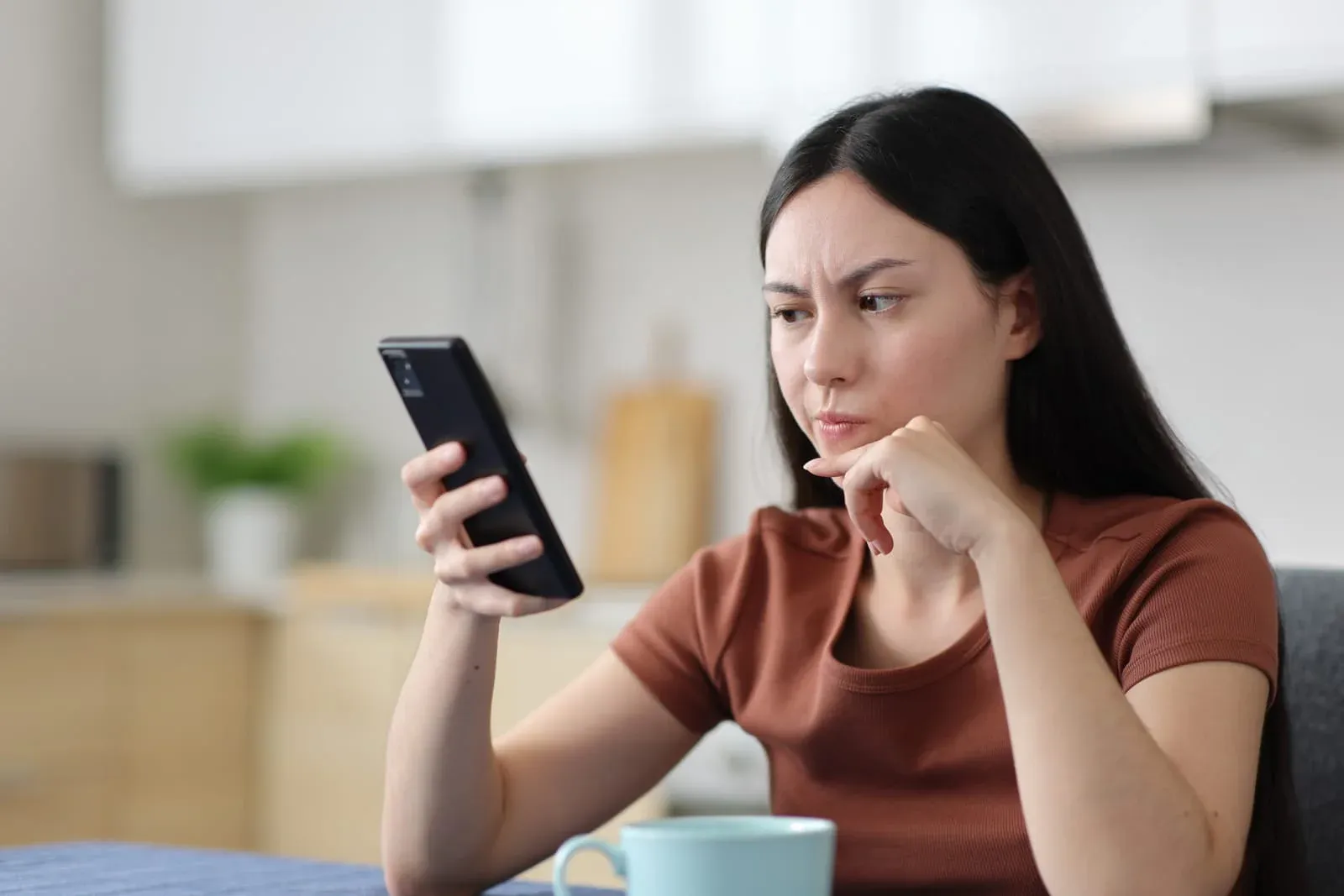 woman wondering how to identify unknown caller