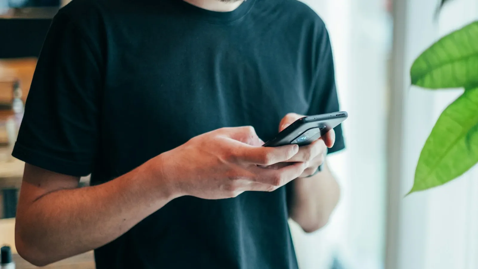 man deciding whether he should delete his old contacts