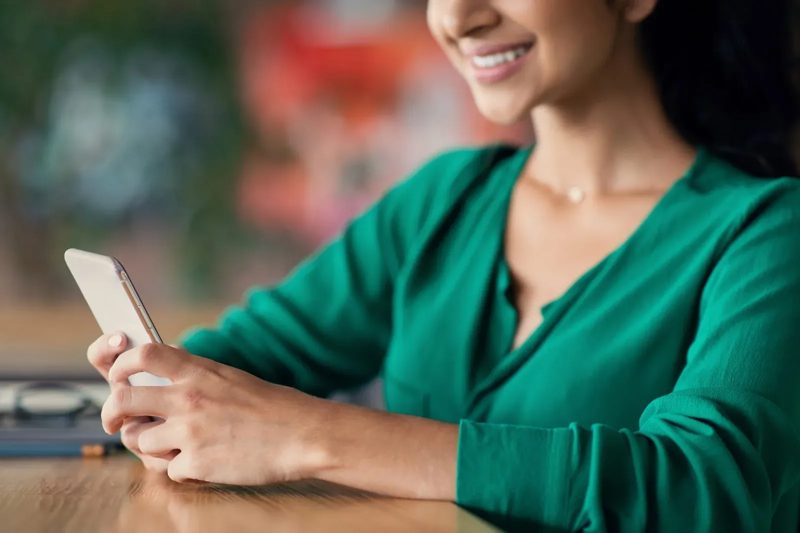 woman organizes her contacts in her phone